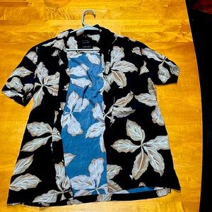 Black and light brown Hawaiian shirt.
